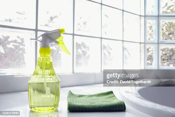 usa, new york state, new york city, brooklyn, cleaning supplies in front of glass brick wall - spray bottle stock pictures, royalty-free photos & images