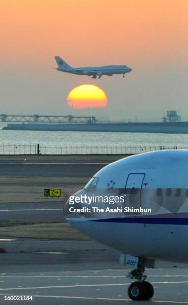 Japanese government aircraft lands at Tokyo International Airport on January 25, 2013 in Tokyo, Japan. The aircrafts carrys the seven survivors and...