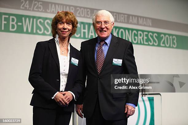 Vice president Gudrun Doll-Tepper and Martin-Peter Buech, head of the DFB Science department, pose after the DFB Science Award during the DFB Science...