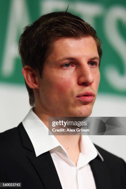 Winner Georg Froese talks on the stage after the DFB Science Award during the DFB Science Congress 2013 at the Steigenberger Airport Hotel on January...