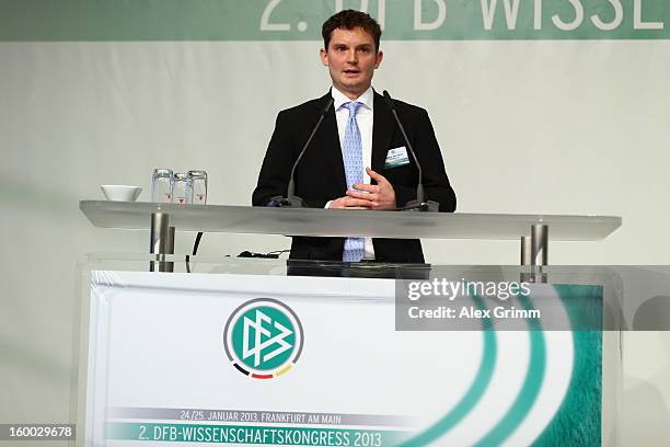 Billy Sperlich of the Wuppertal University addresses the DFB Science Congress 2013 at the Steigenberger Airport Hotel on January 25, 2013 in...