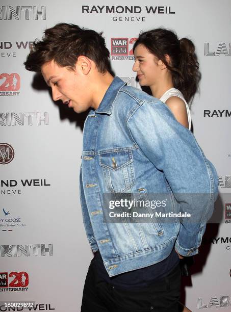 Louis Tomlinson of One Direction and girlfriend Eleanor Calder attend the Raymond Weil pre-Brit Awards dinner and 20th anniversary celebration of War...