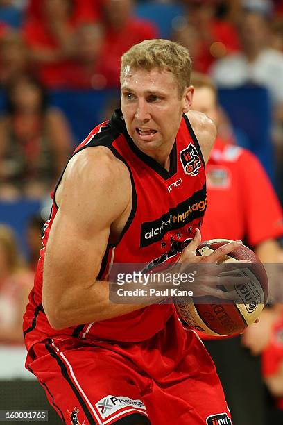 Shawn Redhage of the Wildcats gathers the ball during the round 16 NBL match between the Perth Wildcats and the Townsville Crocodiles at Perth Arena...