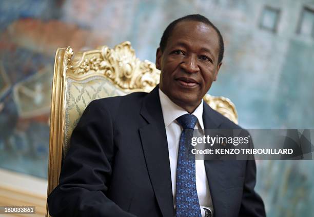 Burkina Faso's President Blaise Compaore smiles on January 23, 2013 during a meeting with France's Junior Minister for Foreign Countries and...