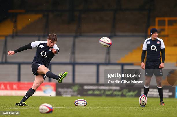 Owen Farrell and Toby Flood of England in action during a training session at the Headingley Carnegie Stadium on January 25, 2013 in Leeds, England.