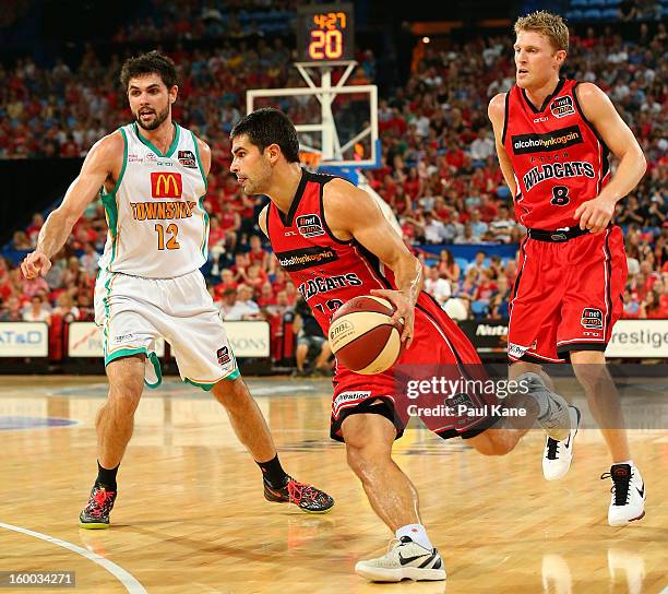 Kevin Lisch of the Wildcats drives into the keyway during the round 16 NBL match between the Perth Wildcats and the Townsville Crocodiles at Perth...