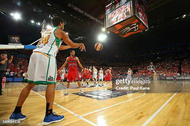 Michael Cedar of the Crocodiles inbounds the ball during the round 16 NBL match between the Perth Wildcats and the Townsville Crocodiles at Perth...