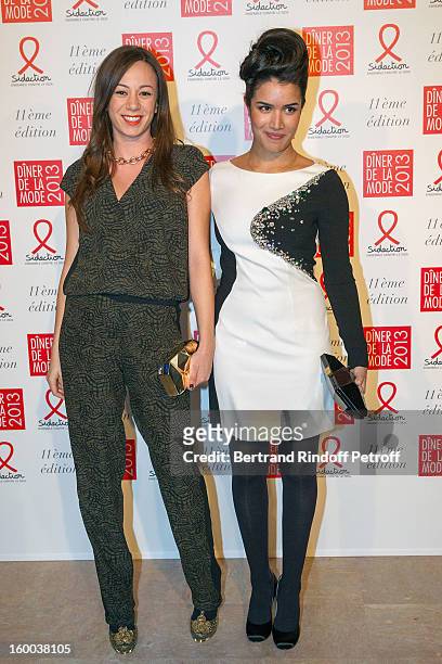 Sabrina Ouazani and guest pose as they arrive to attend the Sidaction Gala Dinner 2013 at Pavillon d'Armenonville on January 24, 2013 in Paris,...