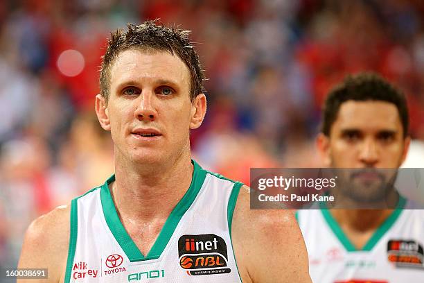 Peter Crawford of the Crocodiles walks from the court after being defeated during the round 16 NBL match between the Perth Wildcats and the...