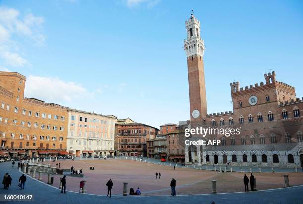 Photo taken on January 25, 2013 in Siena shows a view of the Il Campo square with the Palazzo Pubblico. A derivatives scandal engulfing Italy's Banca...