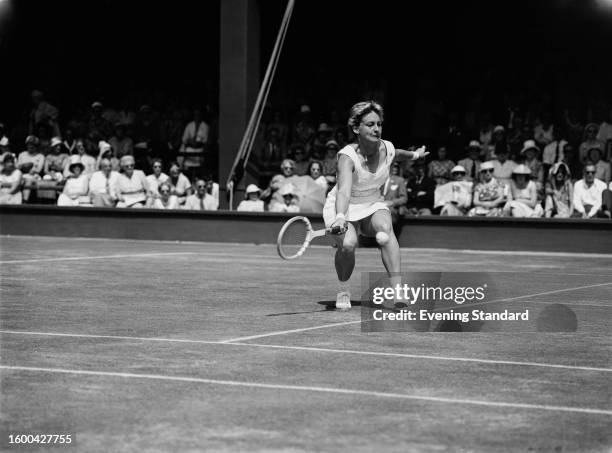 American tennis player Darlene Hard competing to reach the quarter finals of the women's singles at the Wimbledon Tennis Championships in London,...