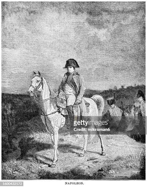 old engraved illustration of napoleon on horseback - napoleon joseph charles paul bonaparte stock-fotos und bilder