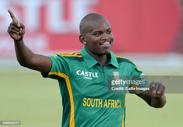 Lonwabo Tsotsobe of South Africa celebrates the wicket of Grant Elliott of New Zealand during the 3rd One Day International match between South...