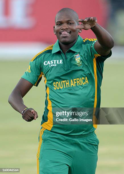 Lonwabo Tsotsobe of South Africa celebrates the wicket of Grant Elliott of New Zealand during the 3rd One Day International match between South...