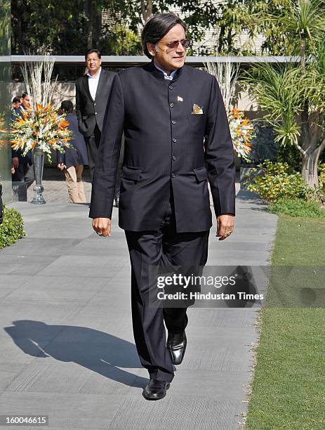 Minister of State for Human Resource Development, Shahi Tharoor arrive at the residence of Parliamentarian and Industrialist Navin Jindal during the...