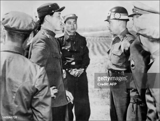 Liaison officer argues with a North Korean counterpart in April 1953 at the crossing point in the truce village of Panmunjom as the armistice talks...