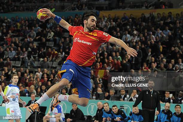 Spain's left back Antonio Jesus Garcia jumps to shoot during the 23rd Men's Handball World Championships semifinal match Spain vs Slovenia at the...