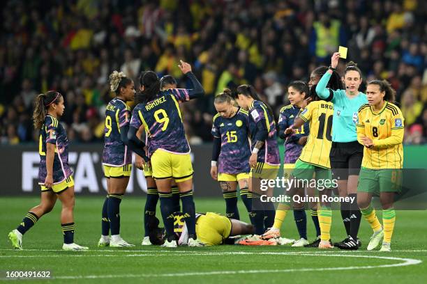 Drew Spence of Jamaica is shown a yellow card by Referee Kate Jacewicz after fouling Linda Caicedo of Colombia during the FIFA Women's World Cup...