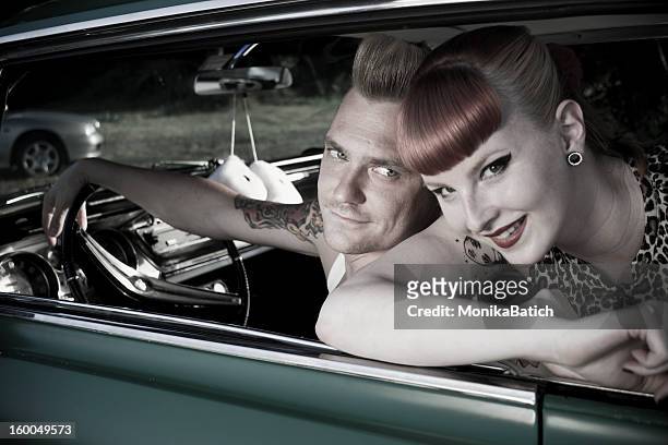 happy rockabilly couple - rockabilly pin up girls stock pictures, royalty-free photos & images