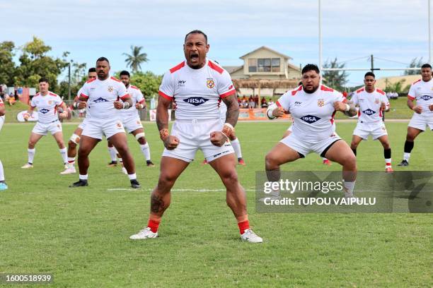 Tonga's rugby captain Sonatane Takulua leads the team in team's Sipi Tau challenge before their international friendly rugby match against Canada in...