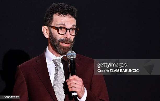 Screen writer and producer Charlie Kaufman speaks during an award ceremony of the Sarajevo film festival, before receiving honorary "Heart of...