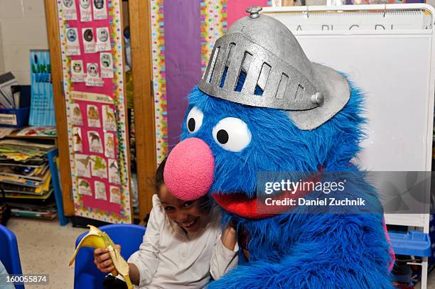 Super Grover teaches kids to be a super hero at the WHEDCo classroom on January 24, 2013 in New York City.