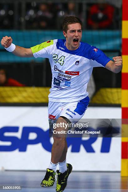 Gasper Marguc of Slovenia celebrates a goal during the Men's Handball World Championship 2013 semi final match between Spain and Slovenia at Palau...