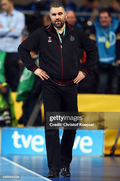 Head coach Brosi Denic of Slovenia looks dejected during the Men's Handball World Championship 2013 semi final match between Spain and Slovenia at...