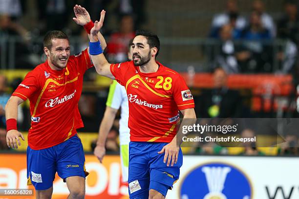 Victor Tomas and Valero Rivera of Spain celebrate a goal during the Men's Handball World Championship 2013 semi final match between Spain and...