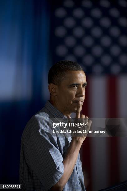 President Barack Obama prepares to deliver remarks during a campaign event at Herman Park in Boone, Iowa, on August 13, 2012.