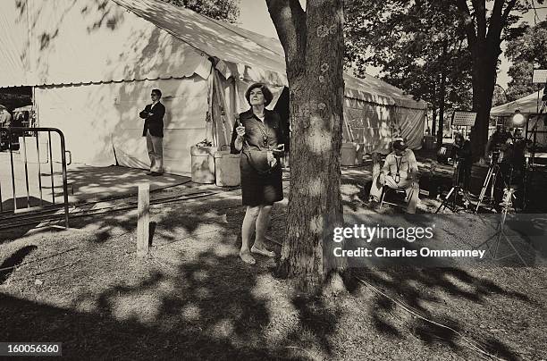 Veteran White House ABC reporter Ann Compton listens in as US President Barack Obama delivers remarks during a campaign event at Herman Park in...