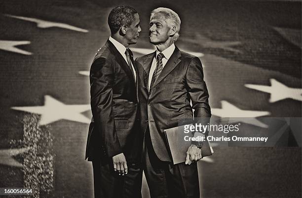 Barack Obama and Bill Clinton onstage after Clinton addressed the Democratic National Convention at Time Warner Cable Arena on September 5, 2012 in...