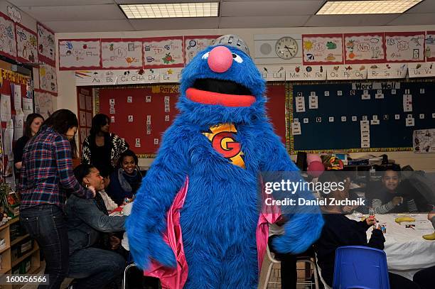 Super Grover teaches kids to be a super hero at the WHEDCo classroom on January 24, 2013 in New York City.