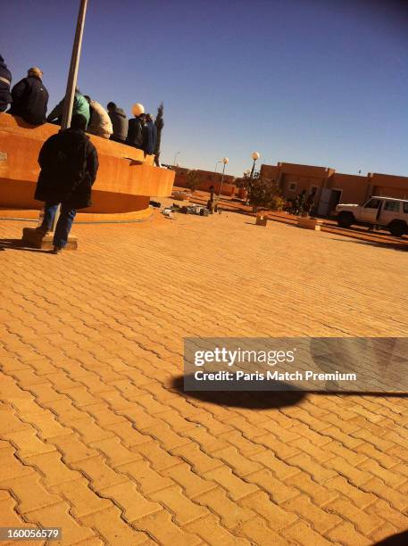 Hostages and their Islamic jihadist captors, who attacked the Algerian gas site of Tinguentourin, are seen in a photograph taken by an unnamed...