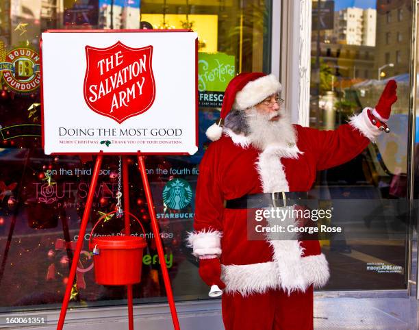 Santa Claus rings a bell for The Salvation Army in front of Macy's in Union Square on December 22 in San Francisco, California. Though much of the...