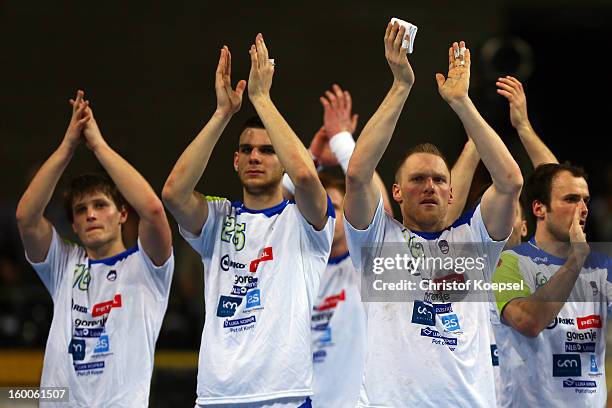 Jure Dolenec, Borut Mackovsek, Miha Zvizej and Marko Bezjak of Slovenia look dejected after losing 22-26 the Men's Handball World Championship 2013...