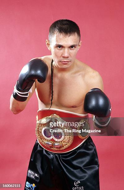 Kostya Tszyu poses for a portrait with his belt in 1997 in Atlantic City, New Jersey.