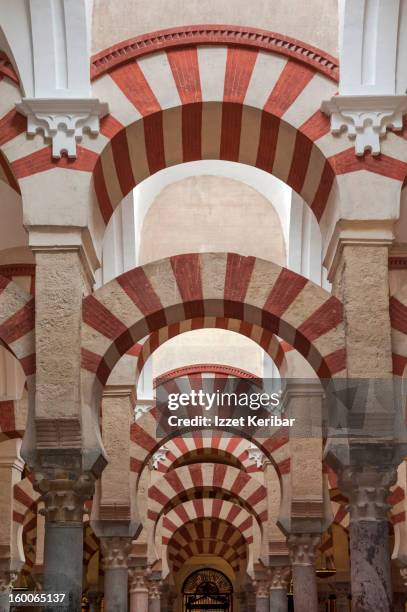 arches inside mezquita - mezquita stock pictures, royalty-free photos & images