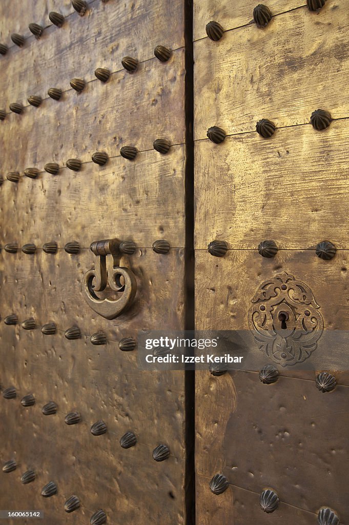 Ancient bronze door at Mezquita