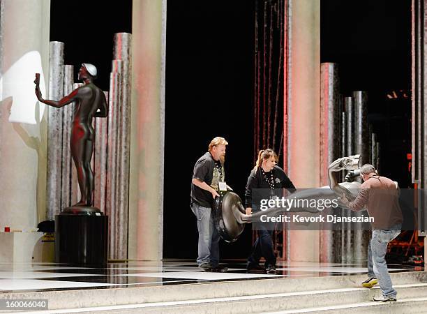 Workers continue to build the stage and the ballroom during the 19th Annual Screen Actor Guild Awards ceremony behind the scenes event at The Shrine...