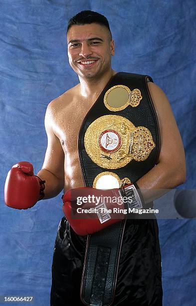 John Ruiz poses for a portrait with his belt in 2001 in New York.