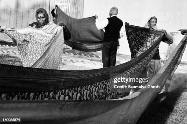 Pilgrims are drying their clothes in the Gangasagar fair camp at Kolkata.