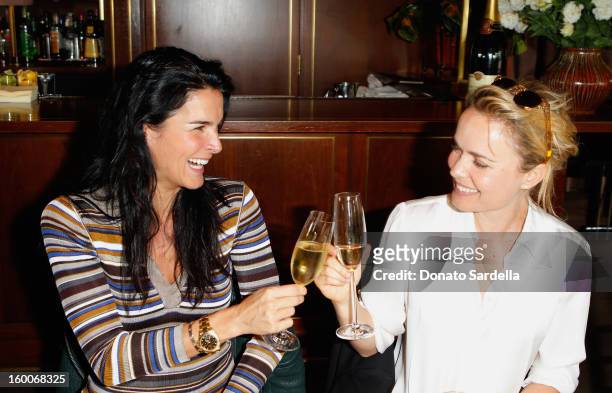 Actresses Angie Harmon and Radha Mitchell attend the Champagne Taittinger Women in Hollywood Lunch hosted by Vitalie Taittinger at Sunset Tower on...