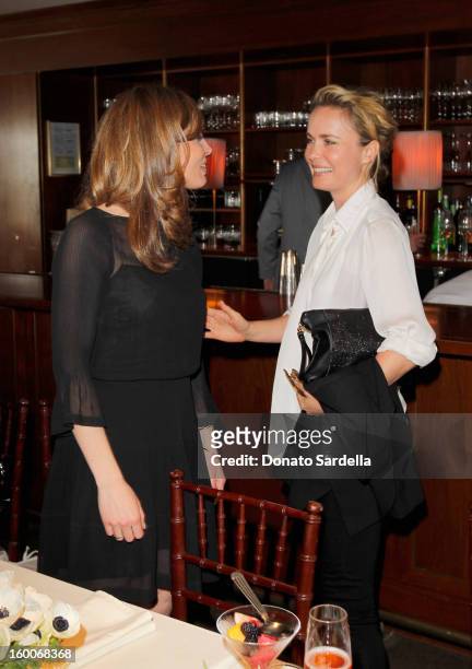Vitalie Taittinger and actress Radha Mitchell attend the Champagne Taittinger Women in Hollywood Lunch hosted by Vitalie Taittinger at Sunset Tower...