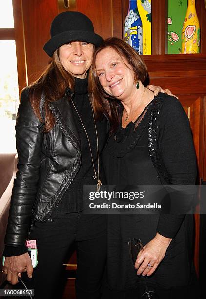 Ellen Meyer and host Cathy Sandrich Gelfond attend the Champagne Taittinger Women in Hollywood Lunch hosted by Vitalie Taittinger at Sunset Tower on...