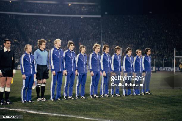 Players of the West German national football team line up ahead of an international friendly match against Brazil at the Volksparkstadion in Hamburg,...