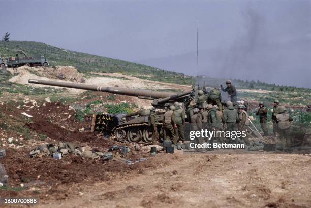 Israeli troops firing a round from a 175mm self-propelled gun toward Palestinian positions on the third day of Israel's invasion of southern Lebanon,...