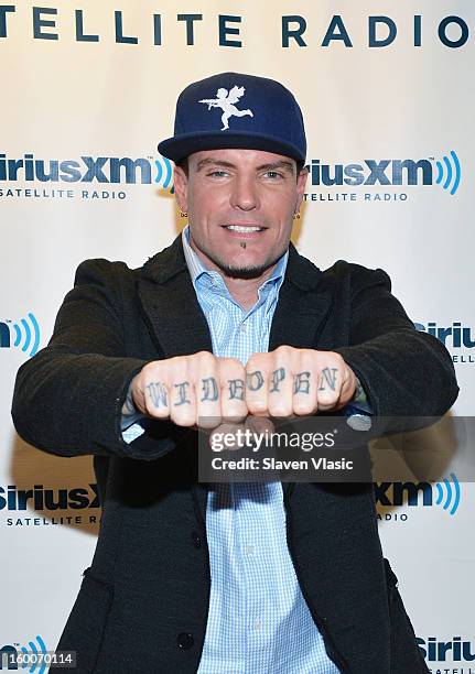 Rapper Vanilla Ice visits SiriusXM Studios on January 25, 2013 in New York City.