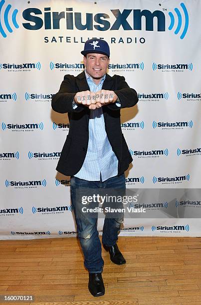 Rapper Vanilla Ice visits SiriusXM Studios on January 25, 2013 in New York City.