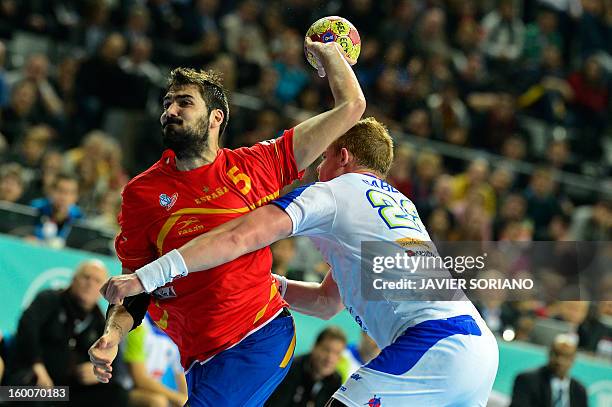 Spain's right back Jorge Maqueda tries to shoot during the 23rd Men's Handball World Championships semifinal match Spain vs Slovenia at the Palau...